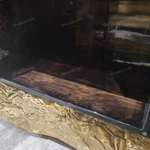 Luxury TV Stand with Bold Stone Top Textured Dark Finish Sculptural Stainless Steel Base and Cabinet Storage